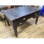 A Victorian stained pine kneehole writing table, width 130cm, depth 90cm, height 76cm