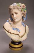 After A. Carrier, a 19th century French bisque porcelain bust of a young lady, 37cm