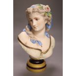 After A. Carrier, a 19th century French bisque porcelain bust of a young lady, 37cm