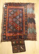 A Turkoman saddle rug, 104 x 82cm and a small carpet bag