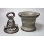 A 16th/17th century bronze mortar, height 16cm, and a cast iron doorstop