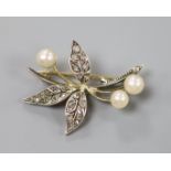 An early 20th century yellow and white metal, cultured pearl and rose cut diamond set floral spray