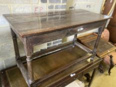 An 18th century oak side table, fitted with a drawer, width 121cm, depth 57cm, height 74cm