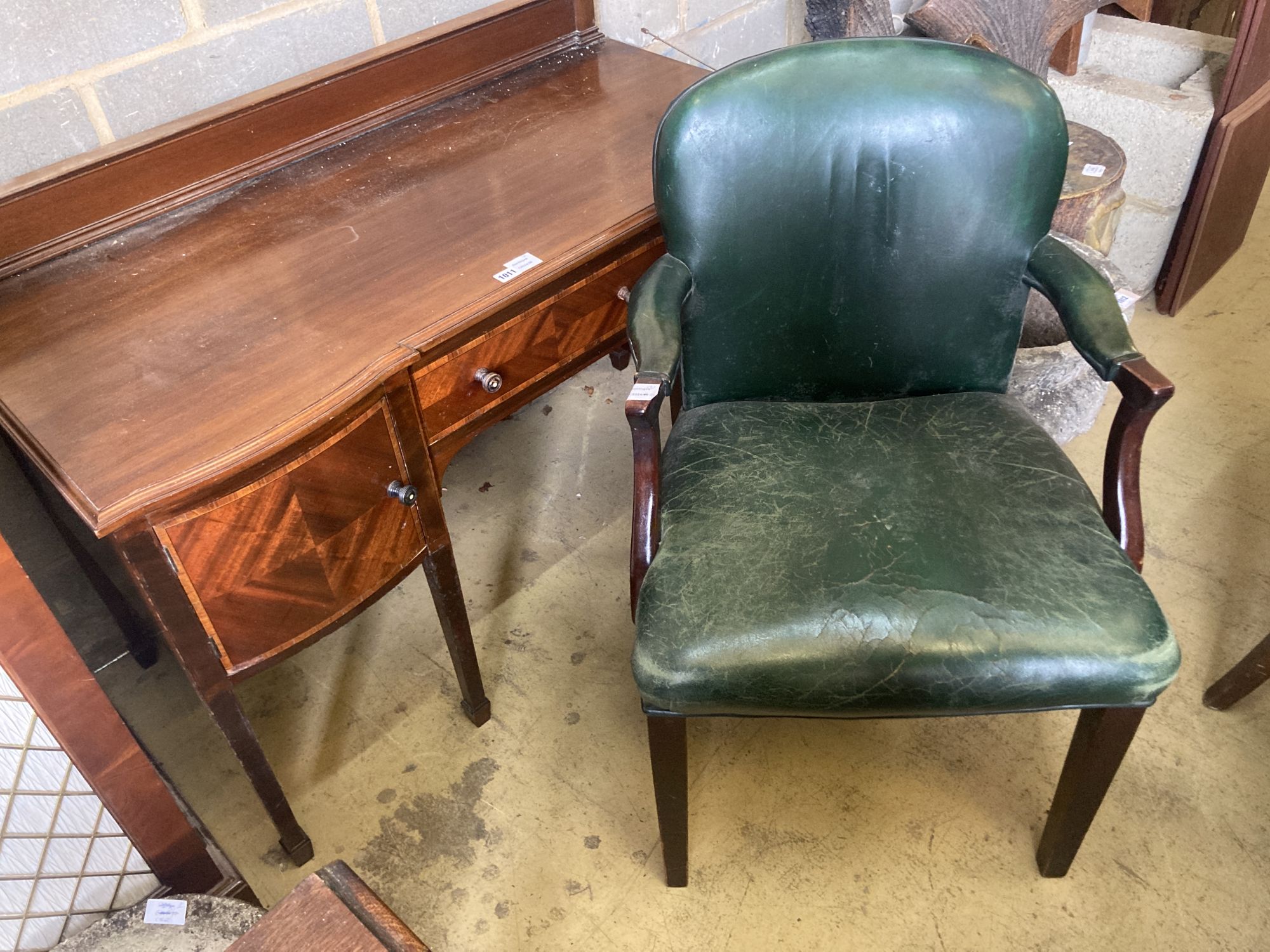 An Edwardian mahogany and satinwood banded shaped front dressing table, width 120cm, depth 58cm,