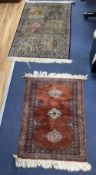 A North West Persian prayer rug, 120 x 77cm, together with a smaller red ground rug