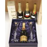 Four bottles of NV Champagne, Perrier Jouet, Bollinger and Louis Roederer, Moet & Chandon and a