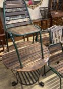 A circular slatted wood and wrought iron garden table, 85cm diameter, height 78cm together with a