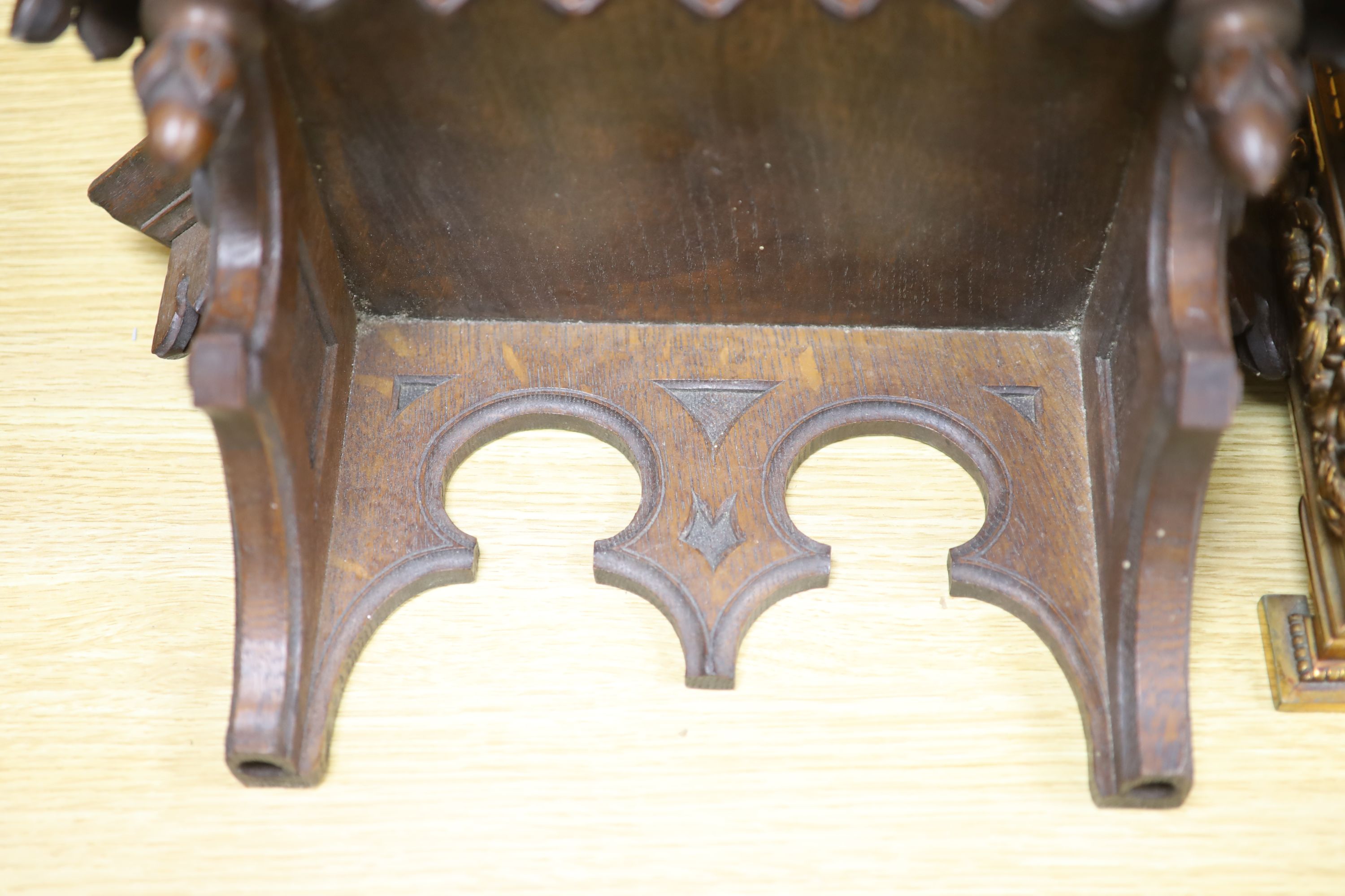 A late 19th century French cast brass cased eight day mantel clock and a carved oak clock bracket, - Image 5 of 5
