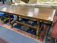 An 18th century Tuscany walnut dining table, with a later top, width 175cm, depth 70cm, height 80cm