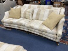 Harrods. Two large two seater settees, upholstered in cream brocade, larger 238cm, depth 118cm,