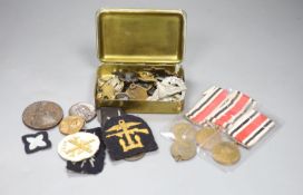 A quantity of Military and Civilian medals / badges