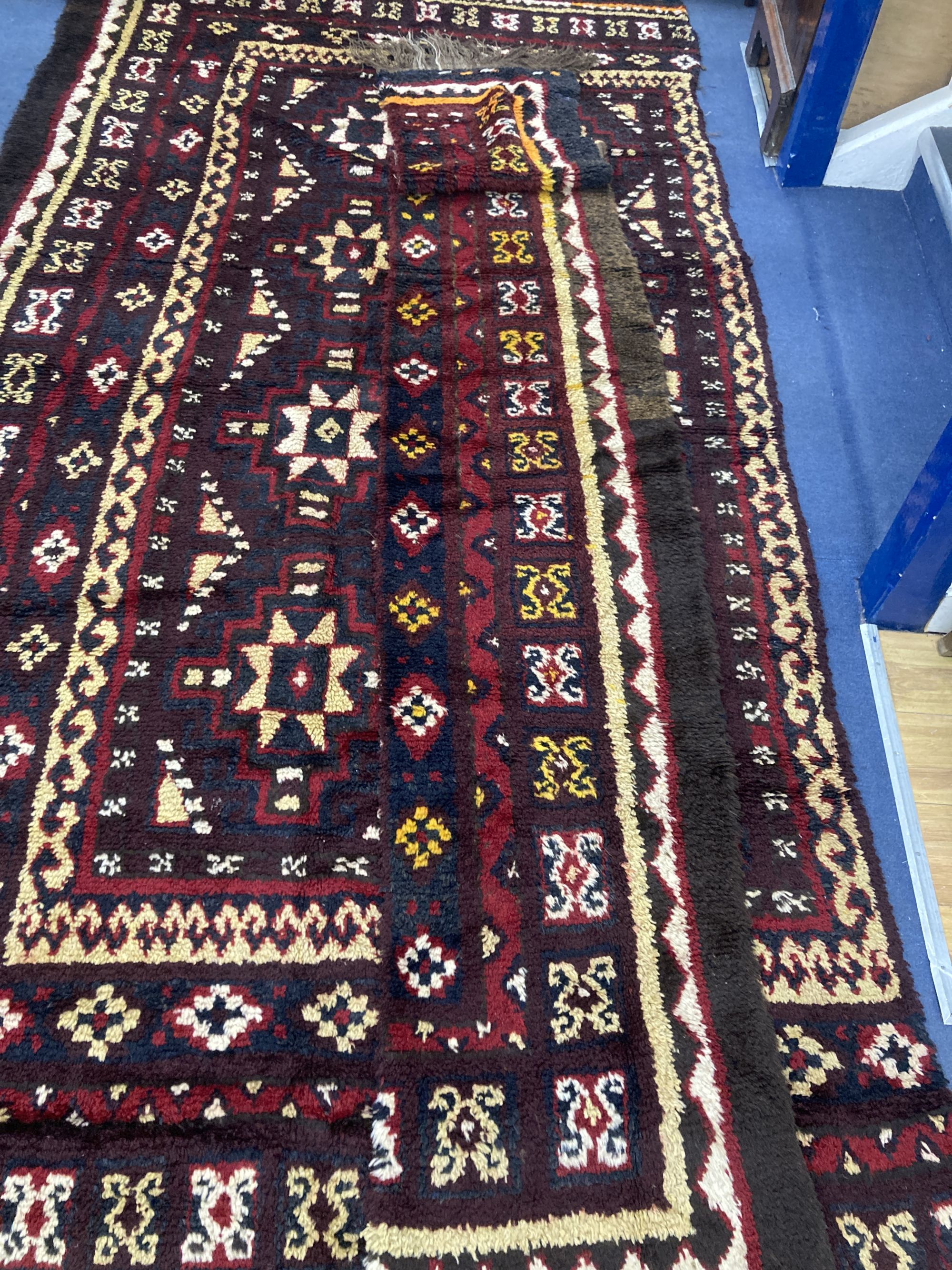 A central Asian wool carpet, 350 x 220cm (in two sections) - Image 2 of 3