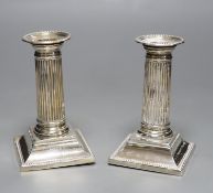 A pair of late Victorian silver dwarf candlesticks, with engraved inscriptions, Martin, Hall & Co,