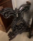 A set of four Victorian style cast iron table supports, each width 54cm, height 66cm