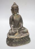 A seated bronze Buddha, height 28cm