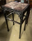 A 19th century Chinese carved hardwood rectangular topped jardiniere stand, with a rouge marble