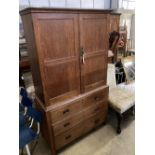 An Arts & Crafts Heals style oak linen press, width 107cm, depth 46cm, height 186cm