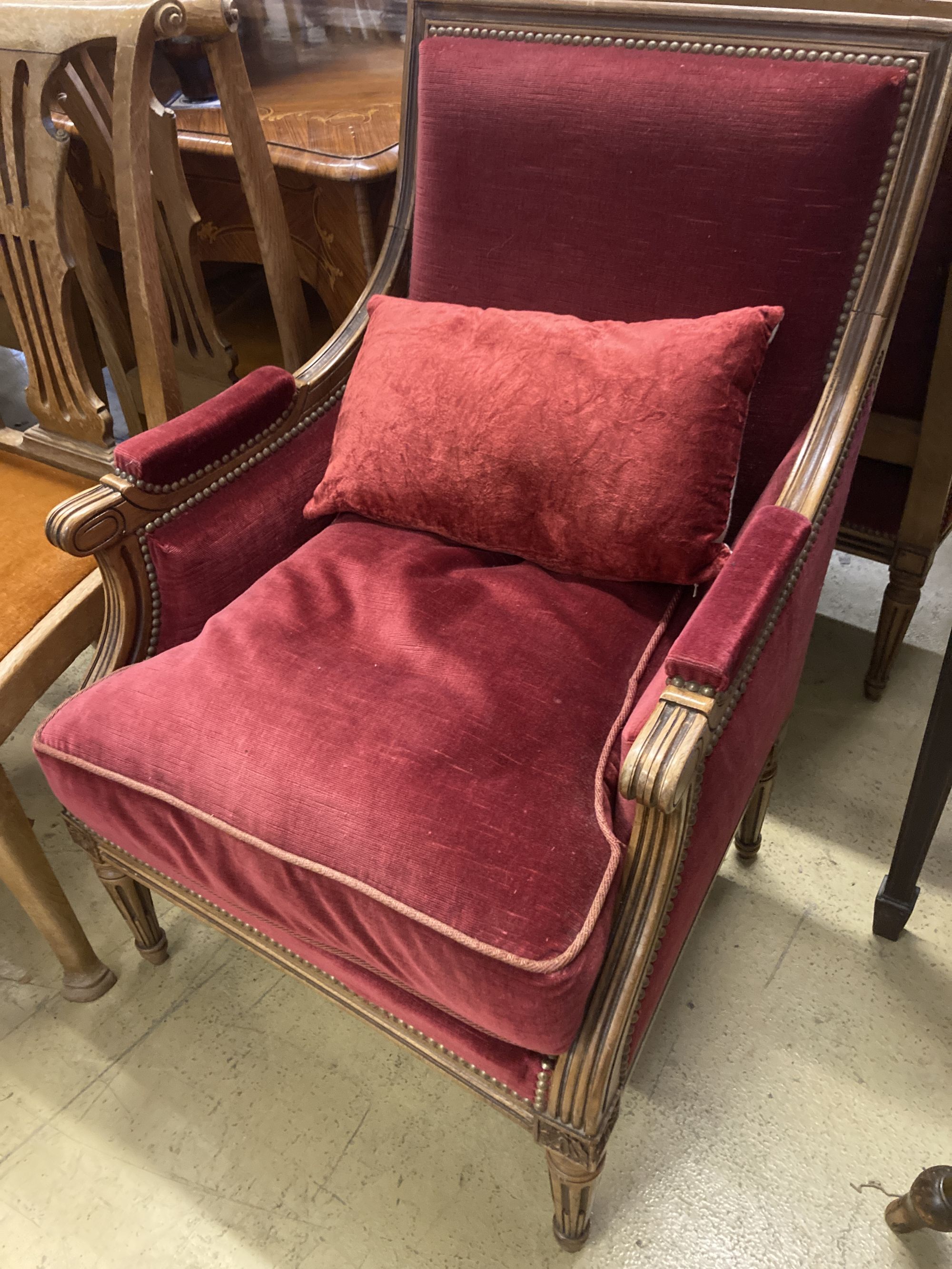 A pair of Louis XVI style upholstered mahogany armchairs, width 64cm, depth 70cm, height 93cm