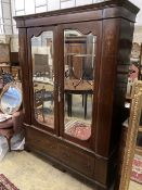 A Victorian inlaid mahogany mirrored wardrobe of two doors, length 146cm, depth 48cm, height 206cm