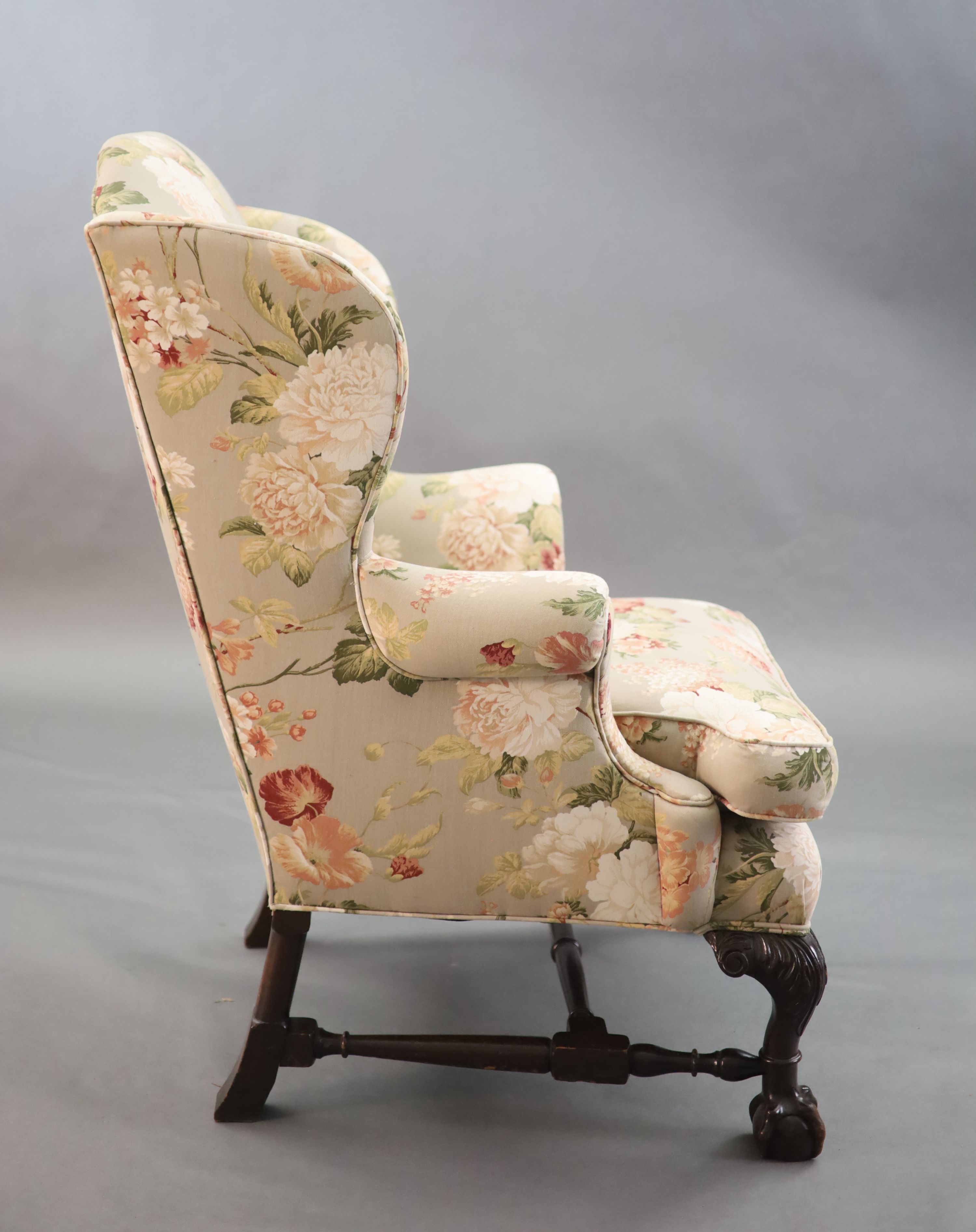 A Chippendale revival wing armchair together with a matching contemporary footstoolCONDITION: Late - Image 4 of 9