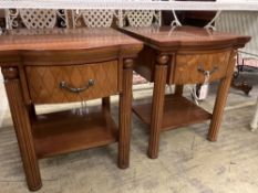 A pair of reproduction walnut bowfront bedside tables, width 50cm depth 50cm height 61cm