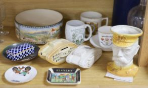 A quantity of mixed ceramics including commemorative wares, a Kitchener jug, Royal Doulton, etc.