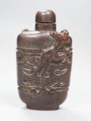 A Chinese archaistic horn snuff bottle and stopper, height 9.5cm