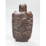 A Chinese archaistic horn snuff bottle and stopper, height 9.5cm