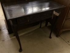 An 18th century oak side table, fitted single long drawers, later carved front, on cabriole