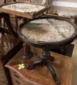 A Victorian rosewood table, with square floral tapestry inset top, over fluted bulbous pillar and