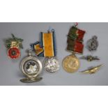 A WWI compass and two medals, together with lapel badges, etc.