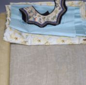 A Chinese gauze work bolt, Qing dynasty, an Indian silk sari, a Chinese bolt of brocade and a