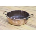 A Victorian copper preserve pan, stamped Benet Fink and Co., Cheapside, 51cm handle to handle