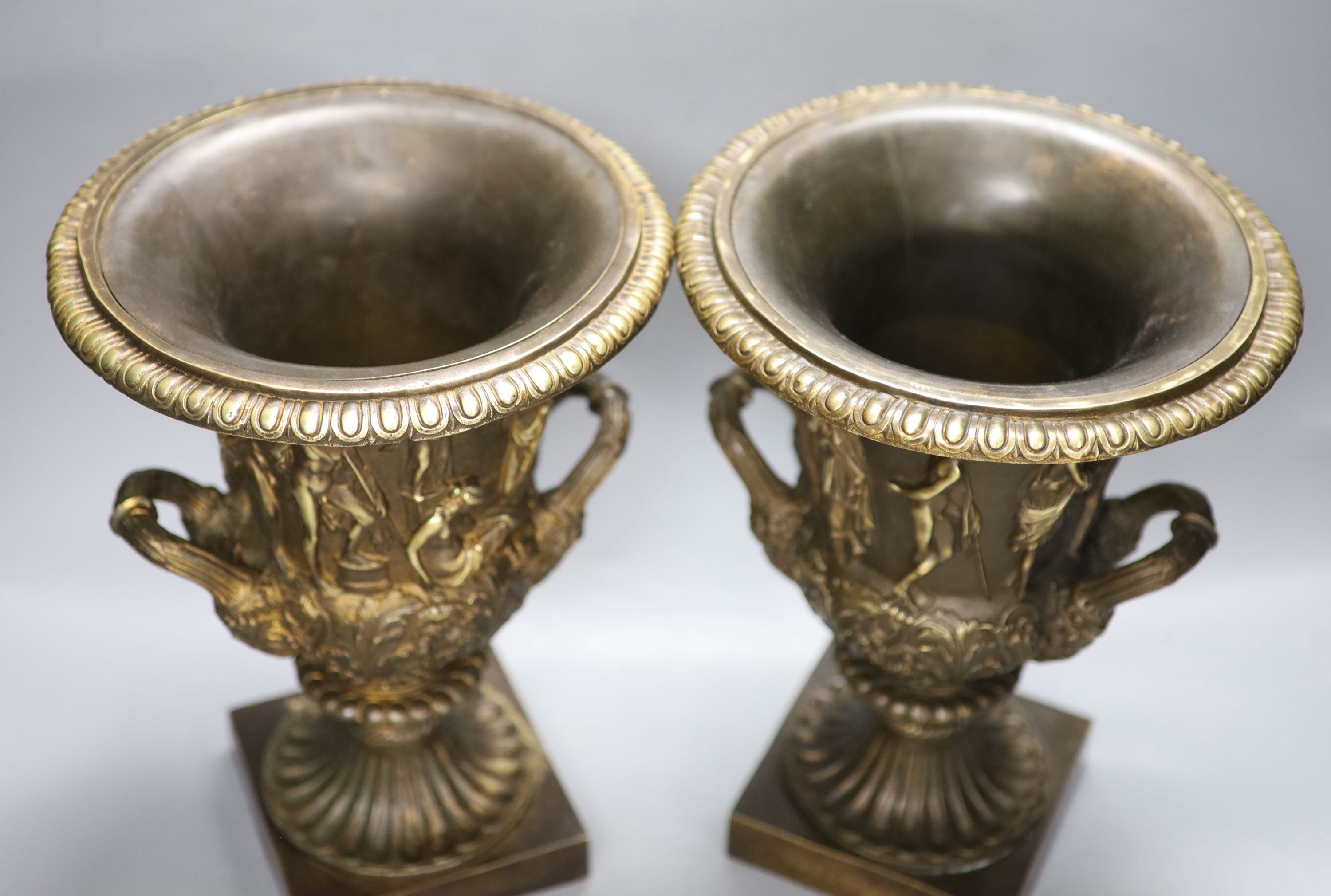 After the antique. A pair of bronze two handled Campana shaped urns, height 32cm - Image 4 of 4