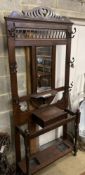 A late Victorian mahogany hallstand, width 93cm, depth 29cm, height 210cm