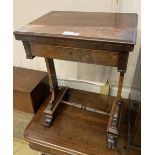 A Victorian rosewood work table, with a folding top, width 54cm depth 38cm height 71cm