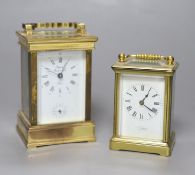 Two French brass eight day carriage timepieces, one with alarm, tallest 13cm with handle down