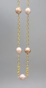 A modern 9ct gold and five stone cultured freshwater pearl choker necklace, 44cm, gross 15.2 grams.