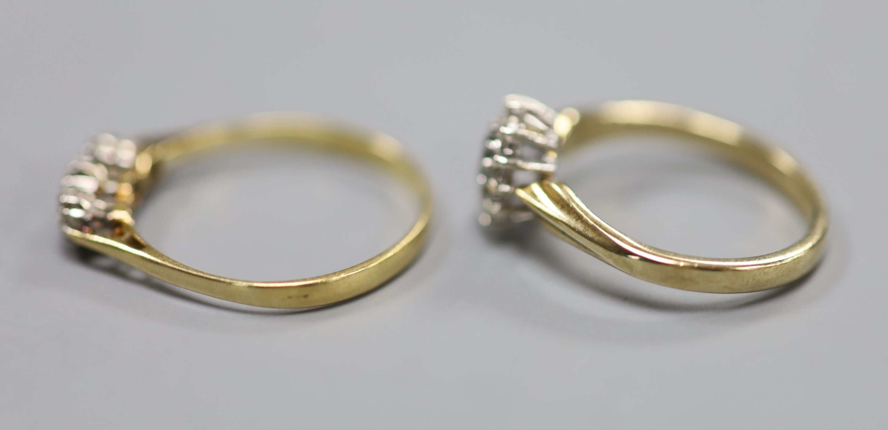 A yellow metal and three stone diamond ring, size Q, gross 1.7 grams and a modern 9ct gold, - Image 3 of 3