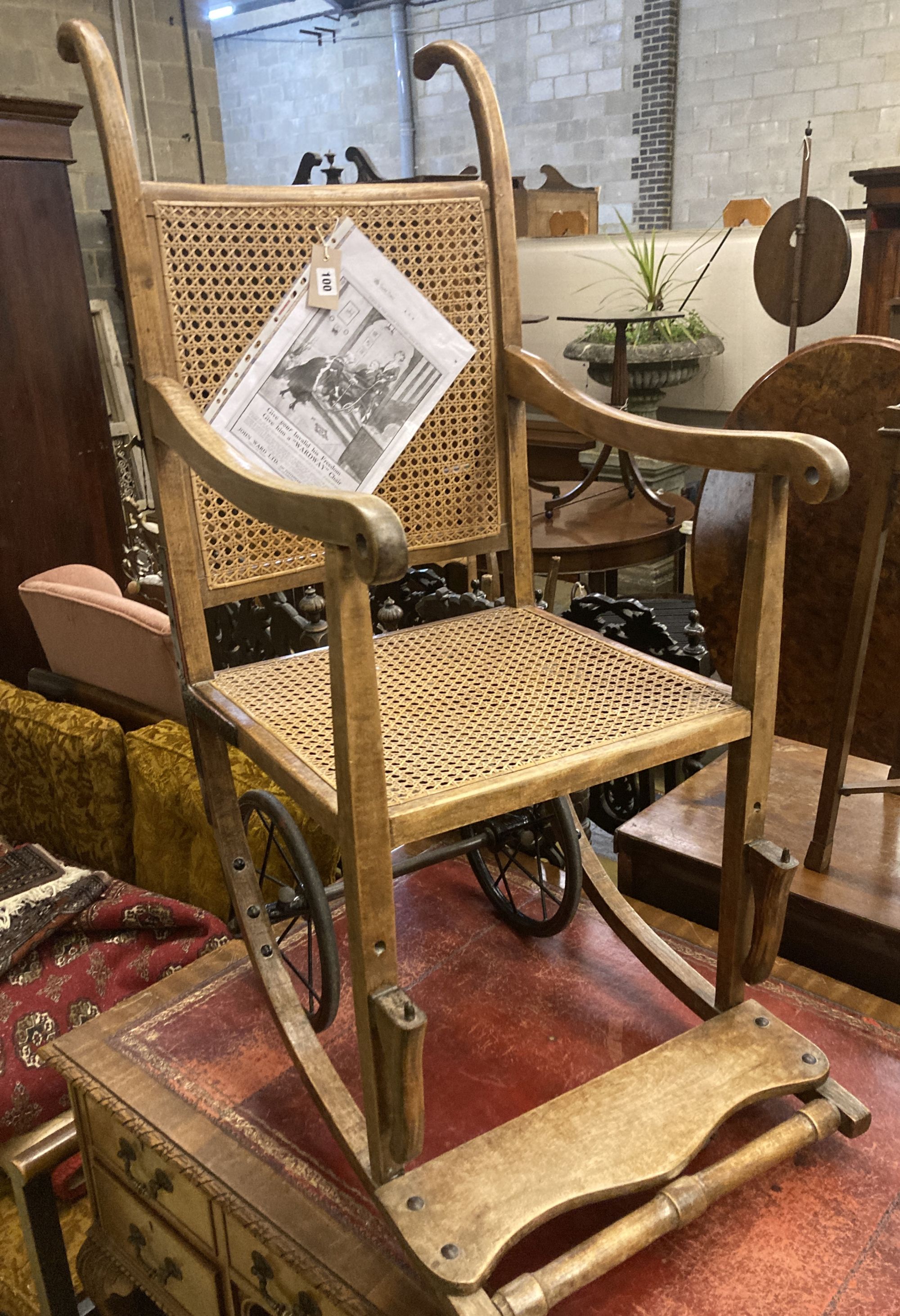 An early 20th century 'Wardway' caned beech invalid's chair, width 50cm, depth 80cm, height 118cm