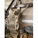 A large composition and oak crucifix, width 126cm, height 218cm