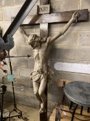 A large composition and oak crucifix, width 126cm, height 218cm