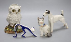 A Victorian porcelain 'owl' oil lamp base, lacking mount, an Austrian porcelain terrier and two