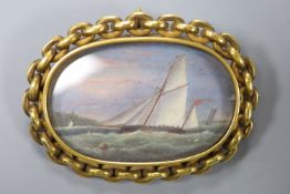 A Victorian oil on ivory miniature of a racing yacht at sea, the reverse inscribed 'A.W.Fowles,