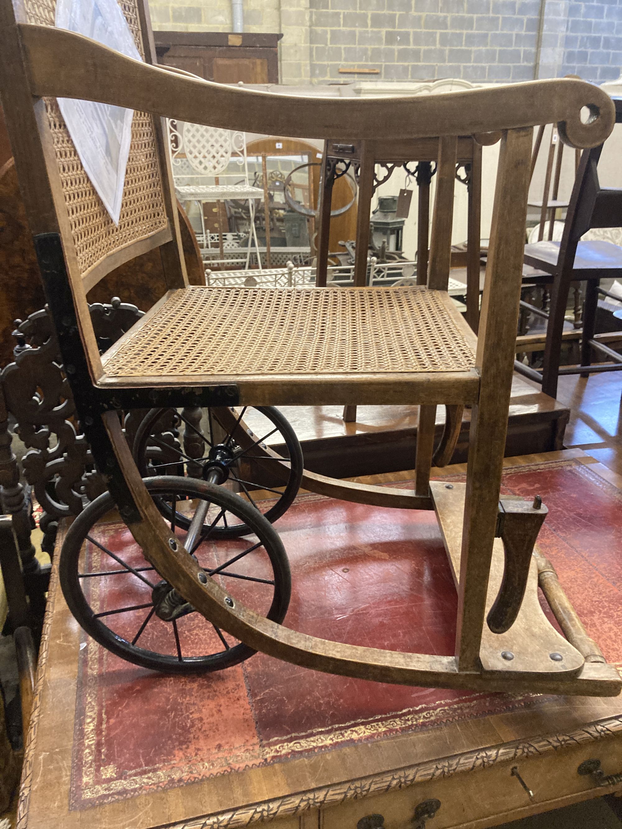 An early 20th century 'Wardway' caned beech invalid's chair, width 50cm, depth 80cm, height 118cm - Image 2 of 5