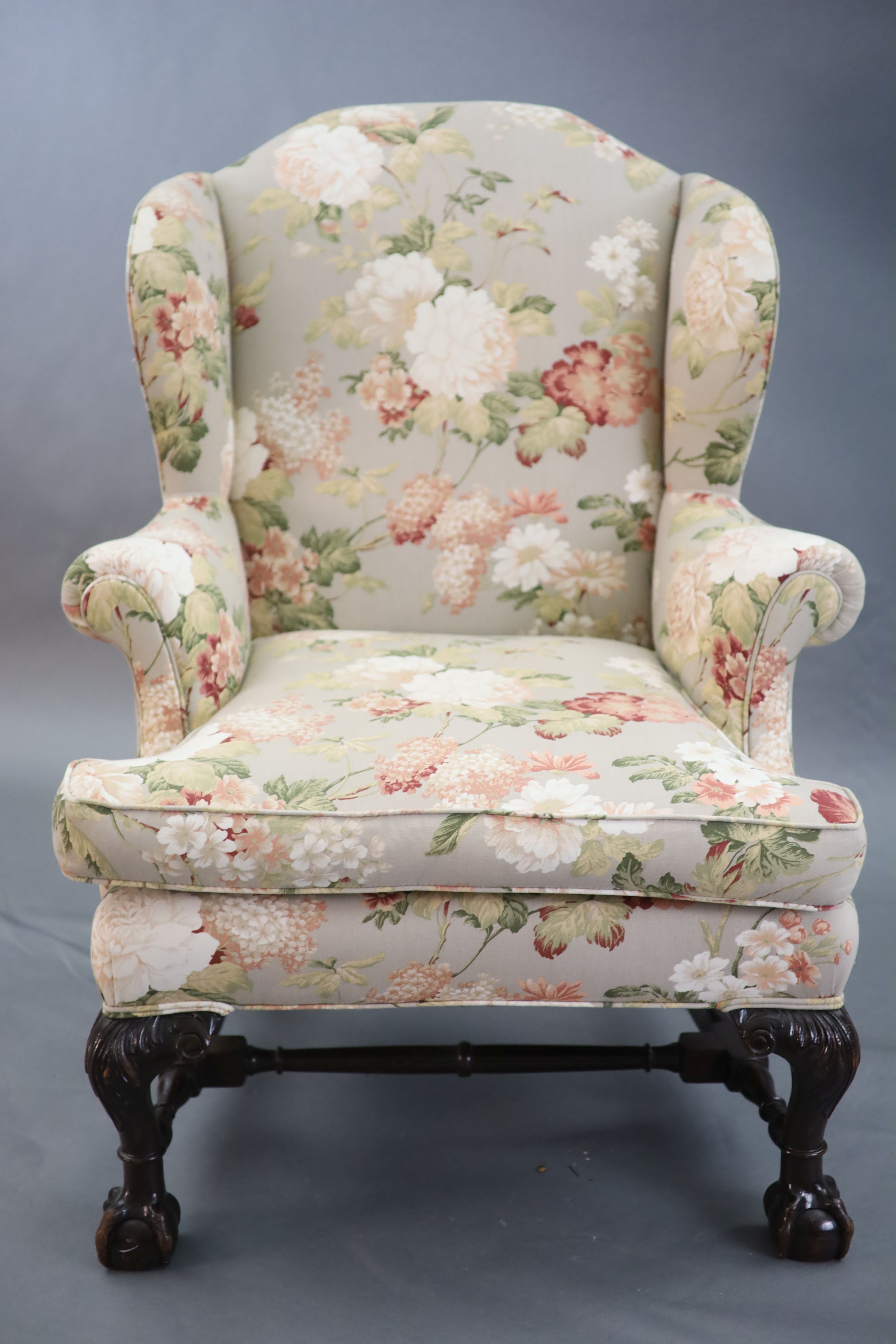 A Chippendale revival wing armchair together with a matching contemporary footstoolCONDITION: Late - Image 3 of 9