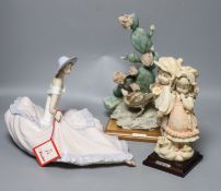 Two G Armani porcelain sculptures and a Nao figure of a lady