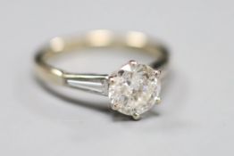 A modern 18ct white gold and solitaire diamond ring, size L, gross 3 grams, stone weighs in excess