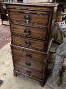 A small banded and inlaid mahogany tall chest of six long drawers, width 52cm depth 37cm height