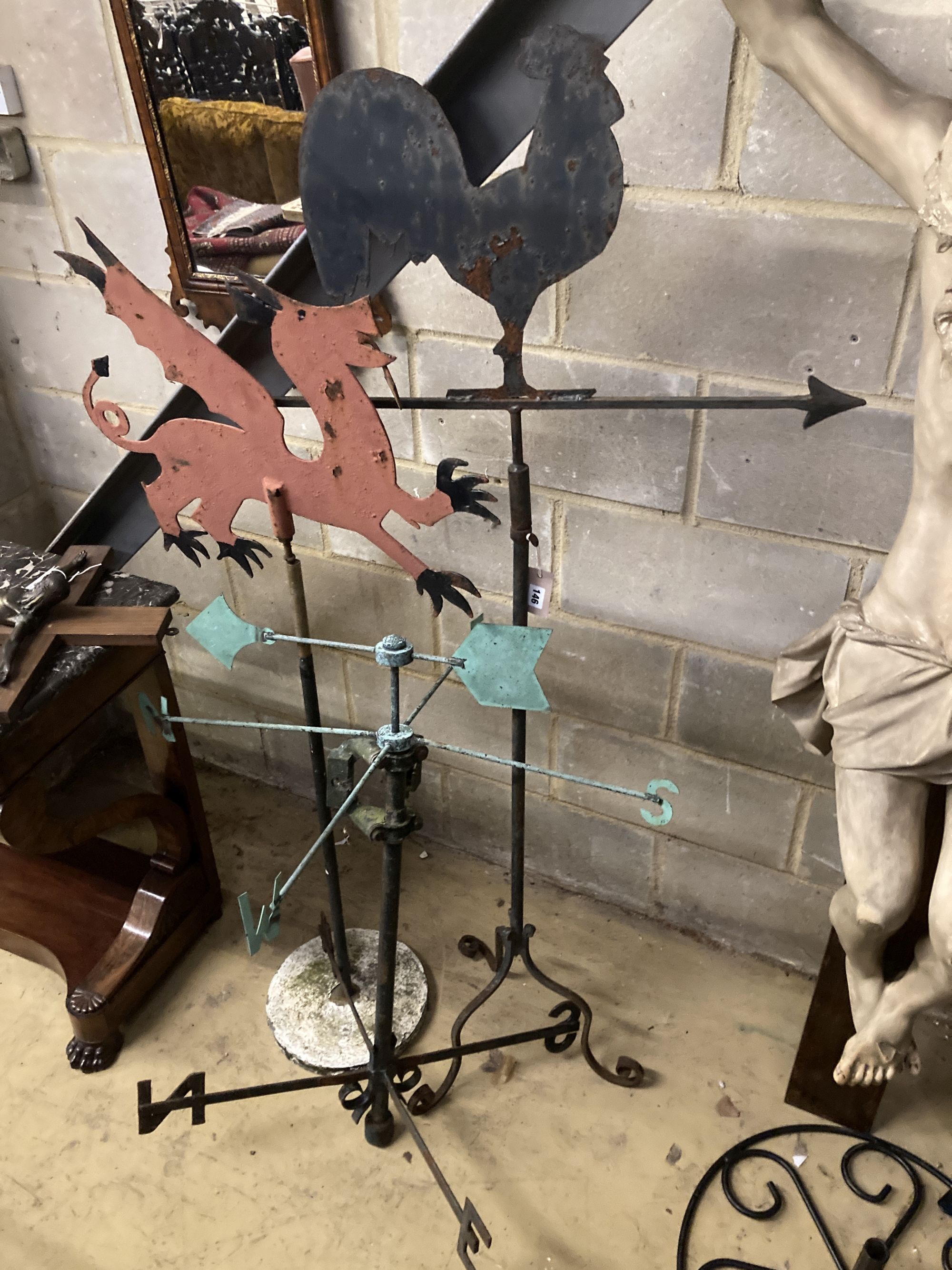 Three cast iron and metal weather vanes, largest 158cm high